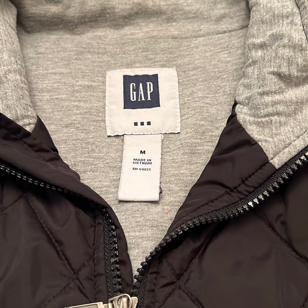 I am selling a Gap vest black and grey in the inside